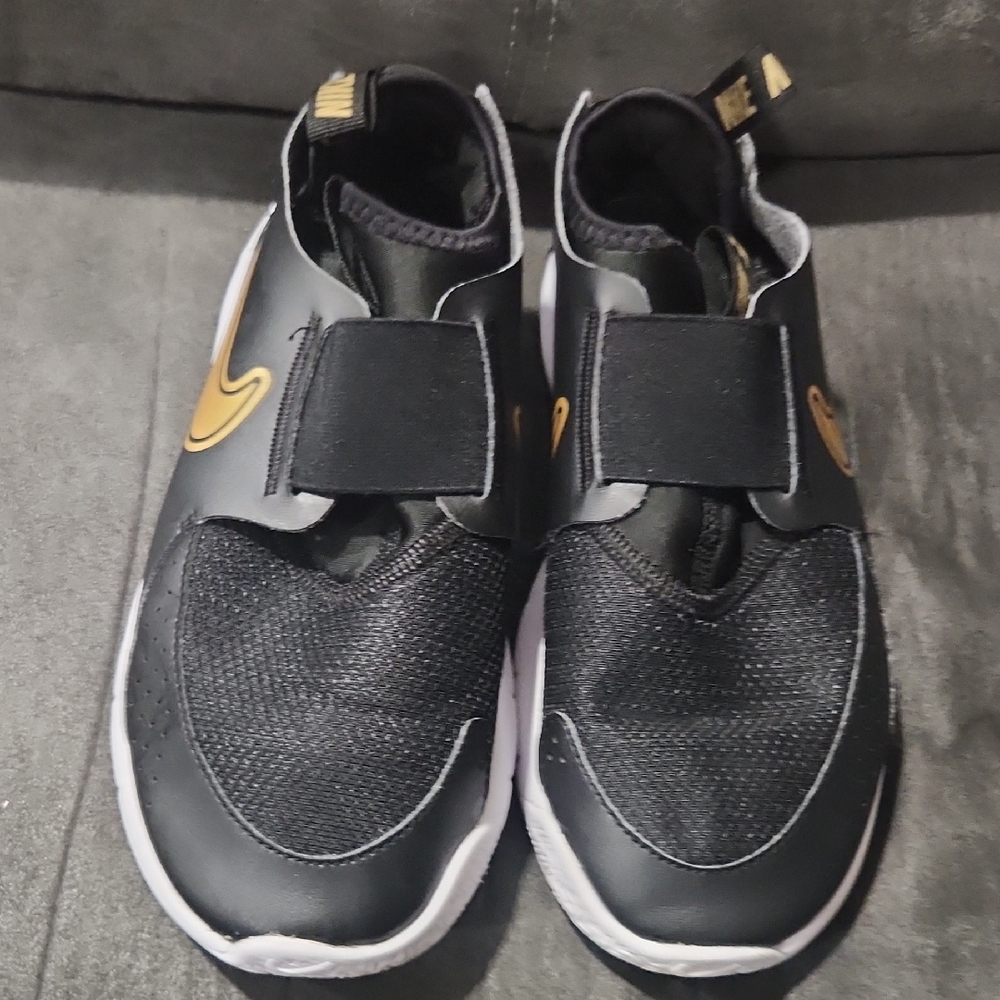 Nike Kids Black and Gold Slip-On Sneakers